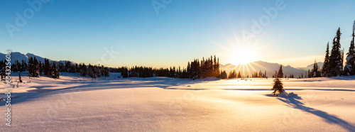 Fototapeta Naklejka Na Ścianę i Meble -  Winter Landscape in Canadian Mountain Landscape. Colorful Sunset.
