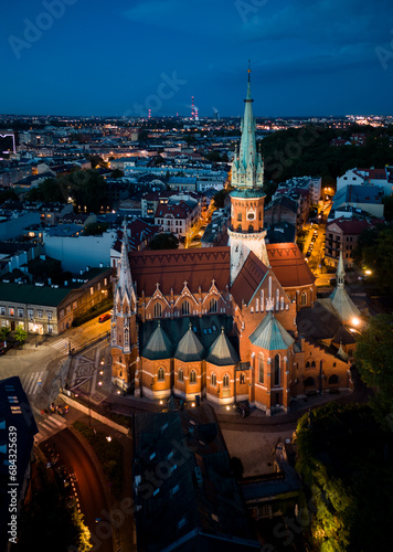St Joseph church on Rynek Podgorski square, Krakow, Poland, aerial view in the night