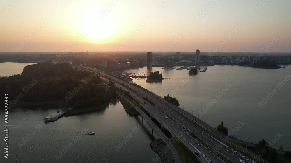 Reverse aerial flight along a highway into the sunset Reverse aerial flight along a highway into the sunset