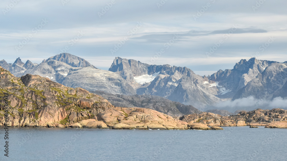 The beautifully stark coastline of Prince Christian Sound, Greenland, much of the glaciers in the area having receded, allowing plant life to take hold.