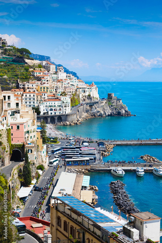 Vertical image of Amalfi with comfortable beaches and azure sea in Campania, Italy © IgorZh