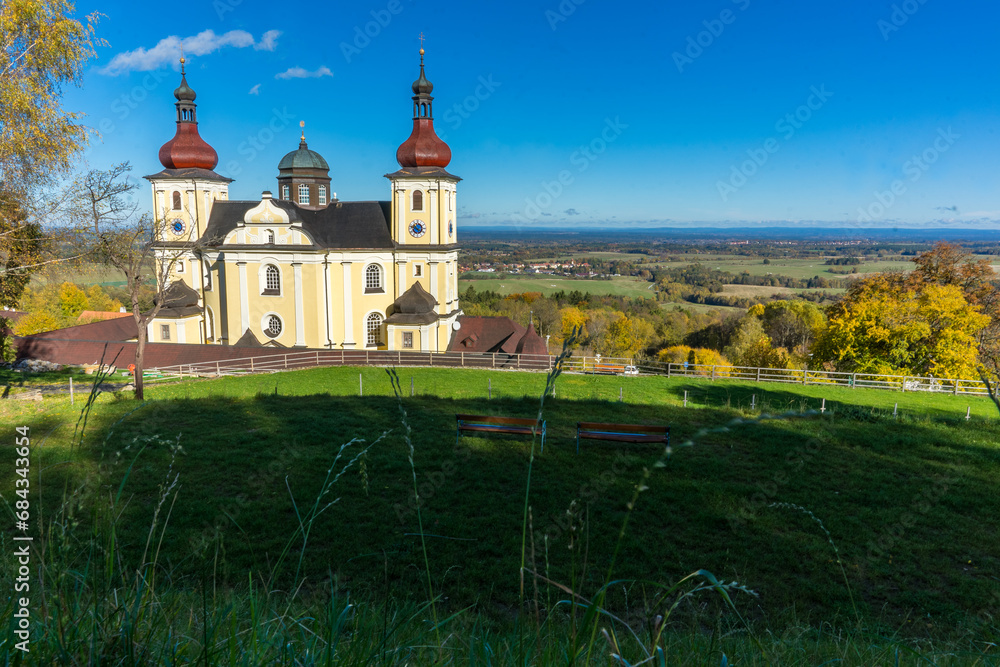 Czech church in autumn with blue sky