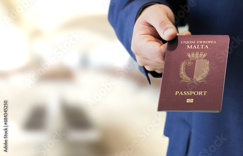 Malta passport, raise hand when boarding to hand over the passport