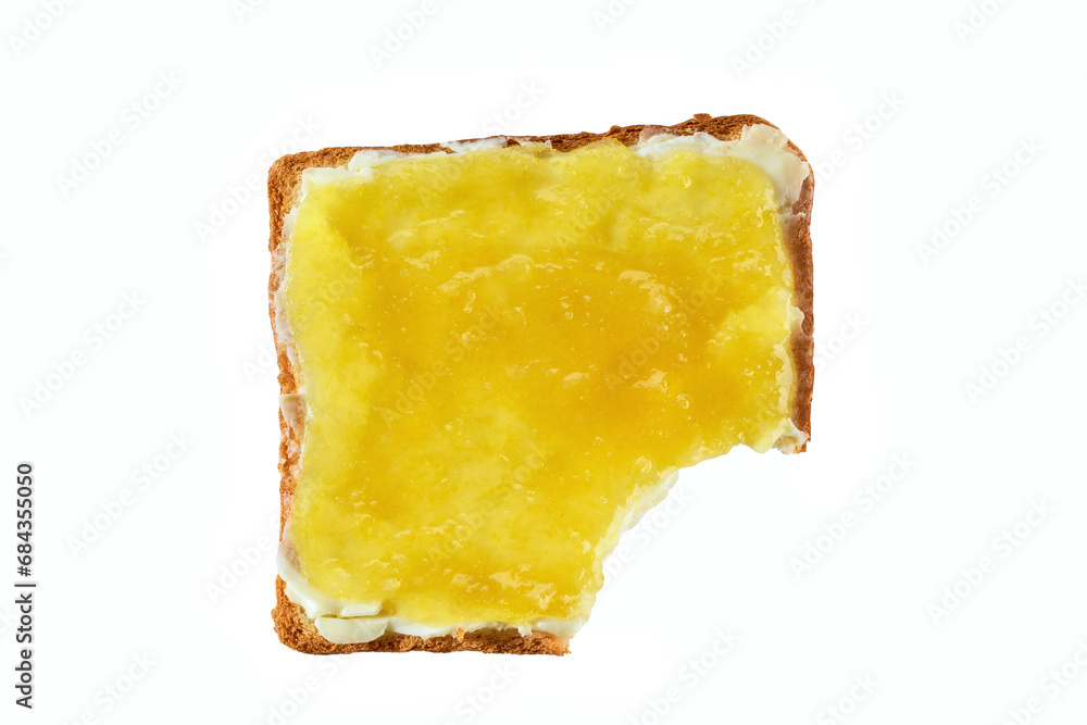 Take a bite toasted bread with lemon jam, isolated on a white. Top view . Bitten toast with lemon jam on white background.