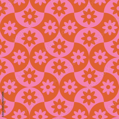 Pink and orange retro flowers on geometric scallop shapes seamless pattern.