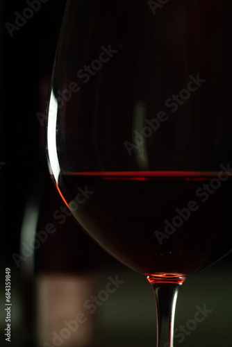 Vertical closeup of a cup of red wine