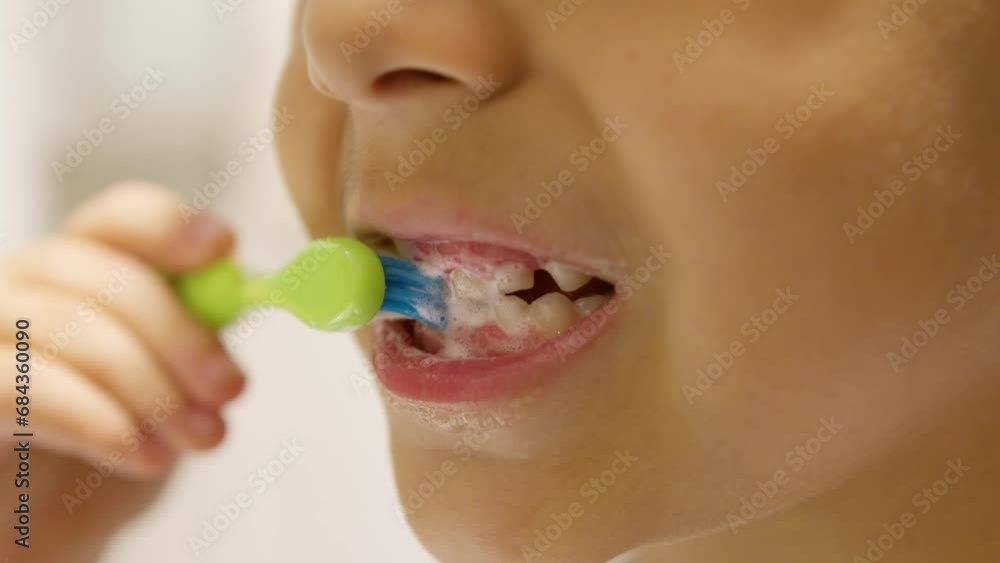 Dental hygiene. Child boy brushing his teeth in bathroom. Close up. High quality 4k footage Dental hygiene. Child boy brushing his teeth in bathroom. Close up. High quality 4k footage