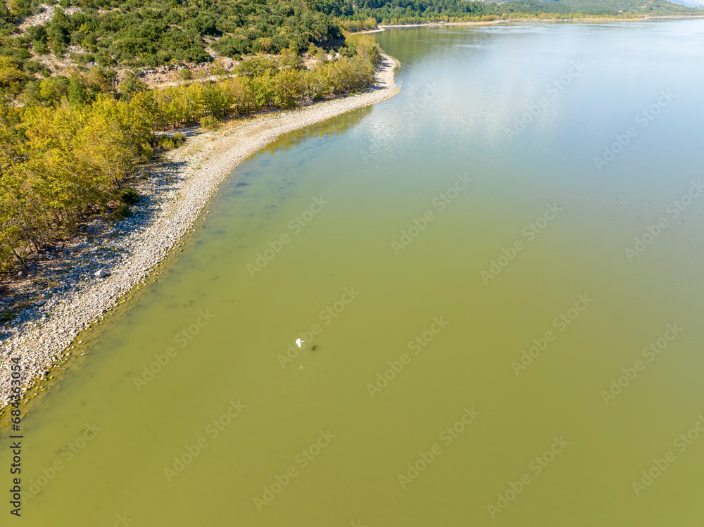 Obraz premium The beautiful landscapes of Kovada Lake, mountains and green area from the air. Isparta Lake District, Turkey