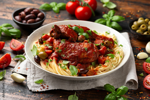 Cacciatore Chicken with spaghetti, vegetables, olives and tomatoes