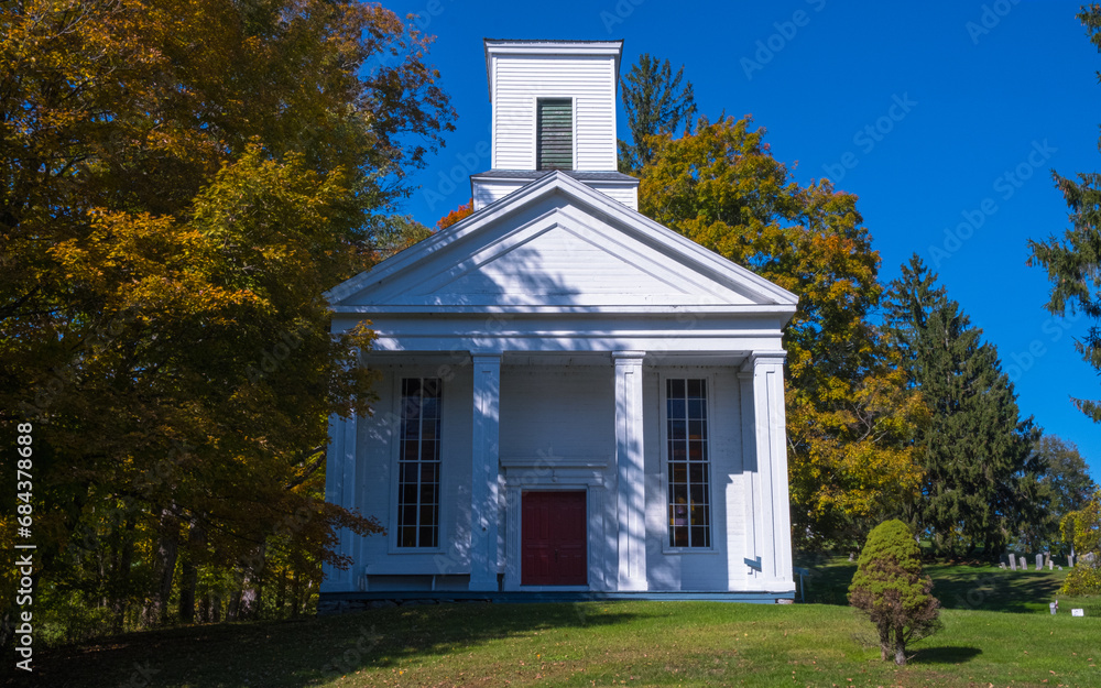 Beautiful Church with Tree Surrounded by Blue Sky Green Grass