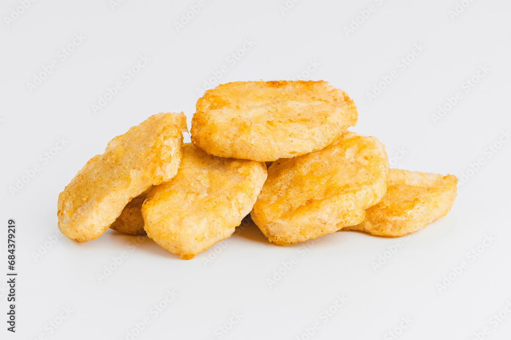 Chicken Breaded Fillet.Fast food. Breaded Chicken Inner Fillet on a White Background,Chicken Breaded Raw Meat. Fast cooking. Breaded chicken nuggets. Homemade food at home. Chicken Breaded Fillet.Fast food. Breaded Chicken Inner Fillet on a White Background,Chicken Breaded Raw Meat. Fast cooking. Breaded chicken nuggets. Homemade food at home.