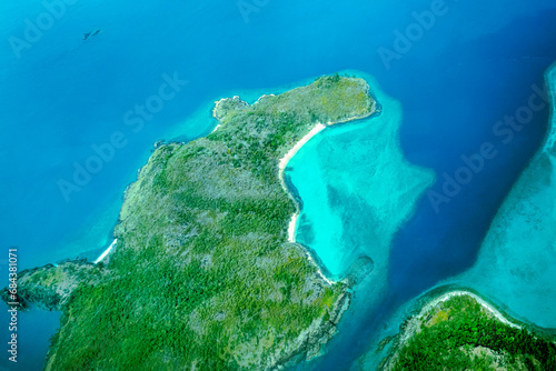 Aerial view of the Whitsunday Islands, in the Great Barrier Reef, the world's largest coral reef system located in the Coral Sea, coast of Queensland, Australia. Dec 2019
