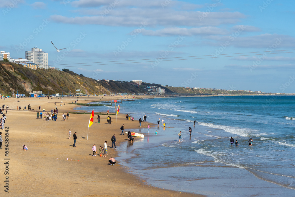 Bournemouth, UK - April 2nd 2023: People on Bournemouth East Beach.
