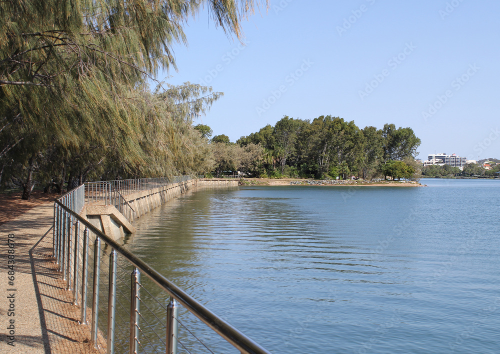 Water, trees and footpath at Spinnaker Park in Gladstone, Queensland, Australia