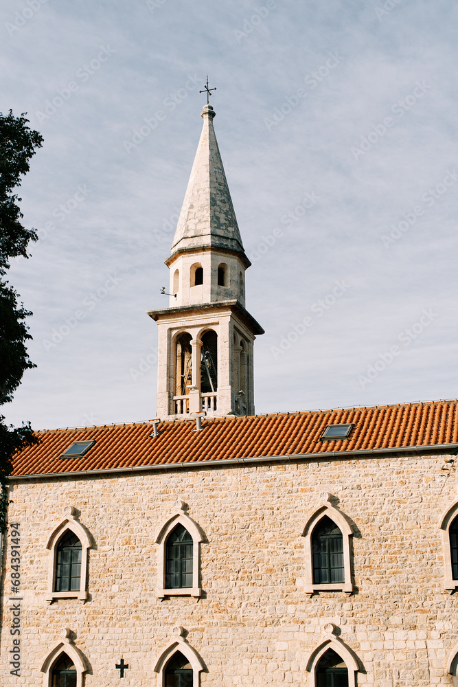 High bell tower of the Church of St. John in Budva. Montenegro