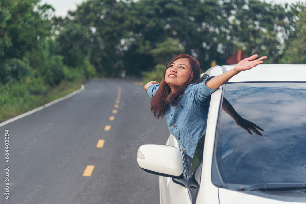 Happy asian women drive new car. Women Hand give remote control car key to man rental car service. Close up hands young woman showing new car key. Women driver giving car rental service smiling face Happy asian women drive new car. Women Hand give remote control car key to man rental car service. Close up hands young woman showing new car key. Women driver giving car rental service smiling face