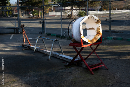 Tree bailer on a Christmas Tree lot, standing ready
