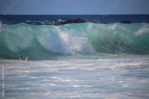 aquamarine waves crashing on the shoreline