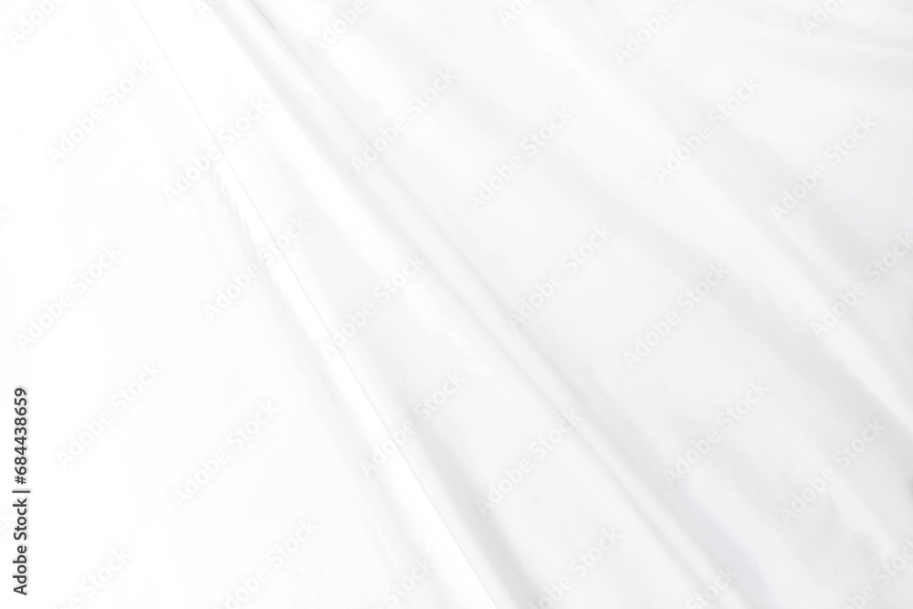 Abstract white fabric texture background Cloth soft wave. Creases of satin, silk, and cotton.