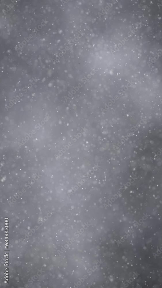 Beautiful silver white loop vertical background with snowfall animation. Beautiful silver white loop vertical background with snowfall animation.