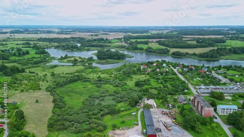 Wallpaper Mural Aerial capture of the forested landscape with flowing branches of river and water bodies  Torontodigital.ca