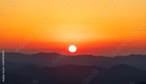 A landscape where the sun is setting. sunset  orange glow
