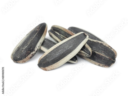 Dried sunflower seeds are ready to eat. Placed isolated on a white background.