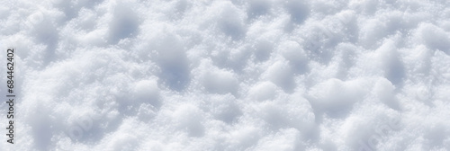 Natural snow texture background, closeup top view 