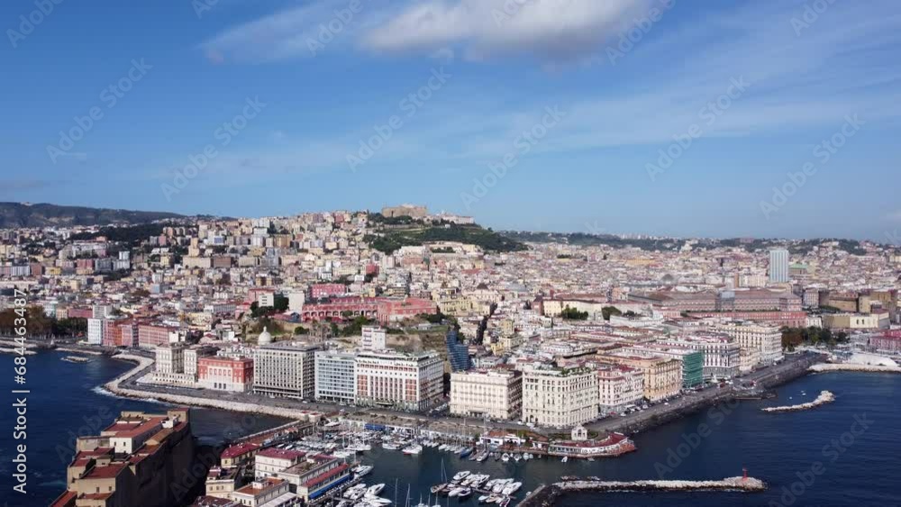 Seafront Neighborhood Of Santa Lucia In Naples, Italy. Ovo Castle Revealed. aerial pullback Seafront Neighborhood Of Santa Lucia In Naples, Italy. Ovo Castle Revealed. aerial pullback