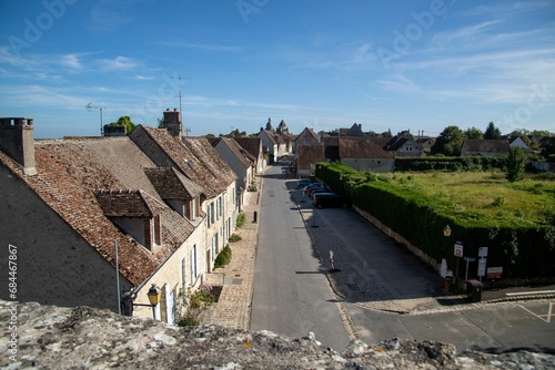 Scenic view of rural houses along the street in Provins, France on a sunny day photo