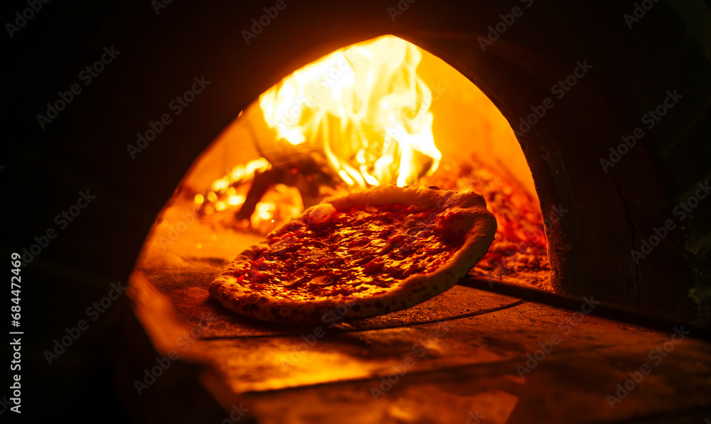 Pizza on a peel in the oven