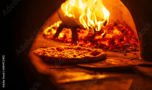 Pizza on a peel in the oven