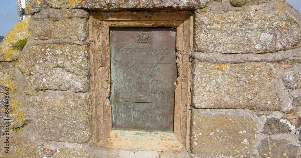 metal and stone plaque depicting the visit of Queen Victoria to Saint Michael's mount metal and stone plaque depicting the visit of Queen Victoria to Saint Michael's mount