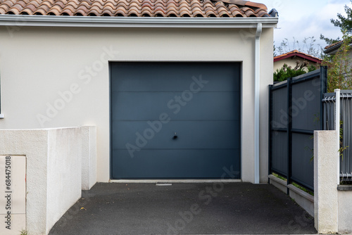 facade gate garage sectional grey dark home door gray of residential house entrance car