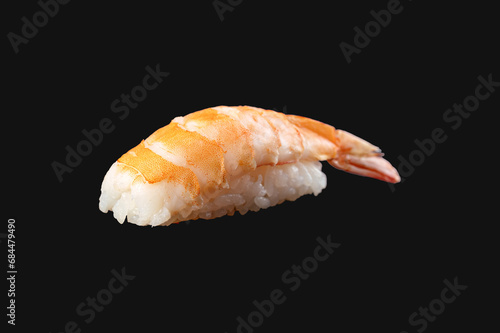 Rice ball on top with shrimp sliced on black background