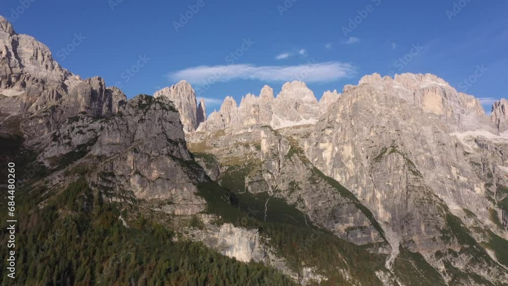 The Campanile Basso in the Brenta group. Drone video of cima tosa, alpine peaks. Cima tosa video 4K aerial view. Cima tosa aerial view by drone. View of one of the most iconic dolomites peak. The Campanile Basso in the Brenta group. Drone video of cima tosa, alpine peaks. Cima tosa video 4K aerial view. Cima tosa aerial view by drone. View of one of the most iconic dolomites peak.
