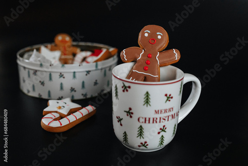 Gingerbread man pastry in the Christms cup photo