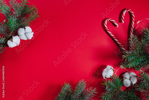 Red Christmas blank background with fir cotton and candies