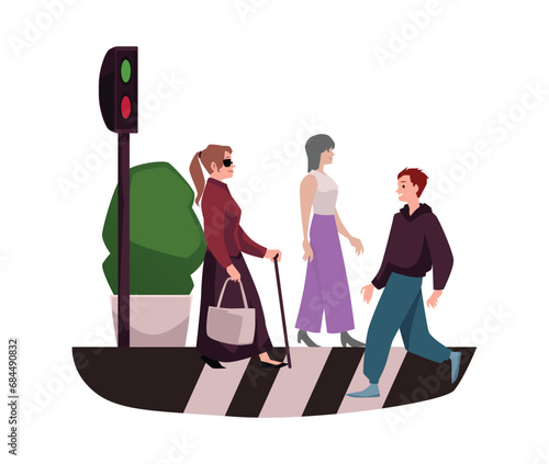 Blind woman crossing the road in the city.