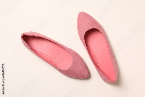 Women's pink shoes on a white background