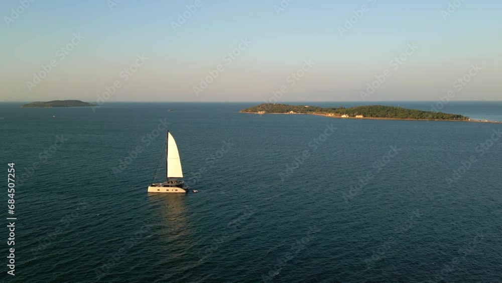 Sailing catamaran in the Aegean Sea in urla izmir Turkey. High quality 4k footage Sailing catamaran in the Aegean Sea in urla izmir Turkey. High quality 4k footage