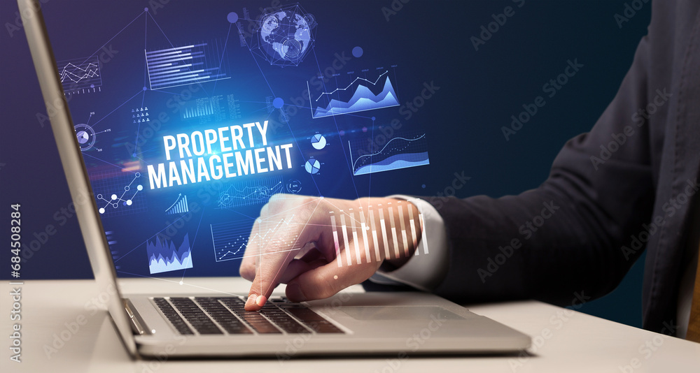 Businessman working on laptop, business concept Businessman working on laptop, business concept