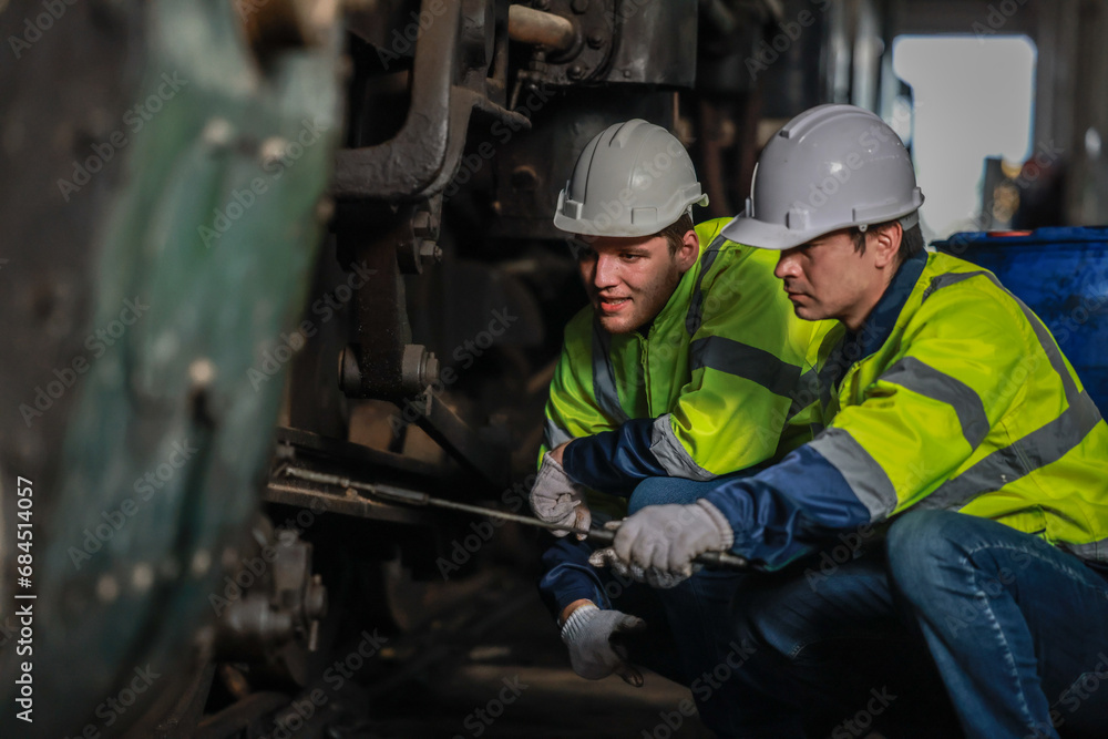 Rail technicians identify, repair engine issues, prevent fuel leaks for efficient train operation Rail technicians identify, repair engine issues, prevent fuel leaks for efficient train operation