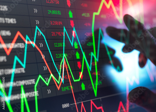Trader checking stock market data on screen photo