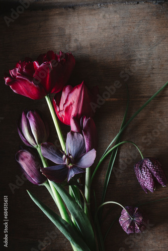 Freshly picked tulips, snakes head fritillaries (Frittilaria meleagris) and Persian lilies (Frittilaria persica) photo