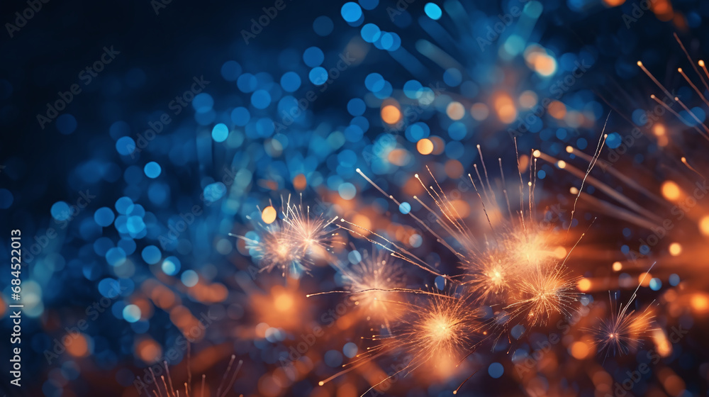 Fototapeta premium Vibrant fireworks display with bursts of red and blue against a night sky