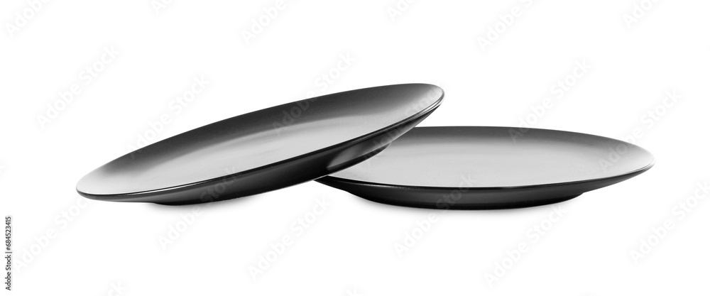 Two clean ceramic plates isolated on white Two clean ceramic plates isolated on white
