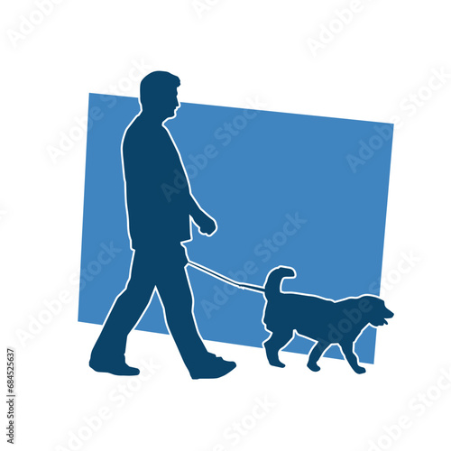 Silhouette of a man walking with his dog pet.