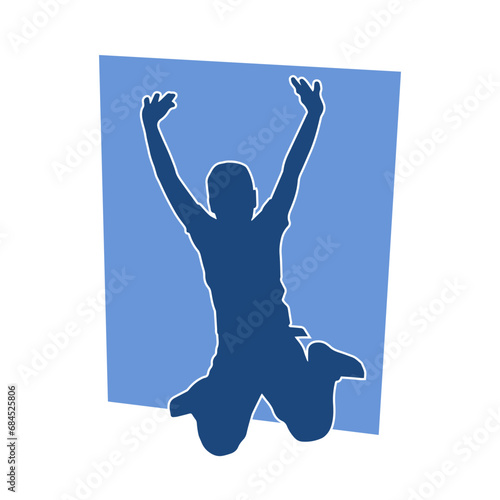 Silhouette of teenager jumping pose. Silhouette of a teen happily jumping.