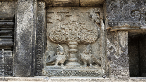 Stone relief on the wall of Prambanan Temple. A Hindu temple located in Yogyakarta, Indonesia